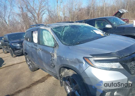 2020 Honda Passport Awd Touring z USA, uszkodzony, nr VIN 5FNYF8H95LB018812